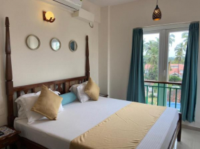 SEaRENITY - 2BHK Beautiful Apartment in Luxury Condo with Pool - Best location in North Goa, Arpora